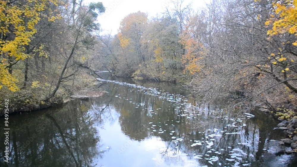 Winding river in autumn with yellow trees on river banks Winding river in autumn with yellow trees on river banks