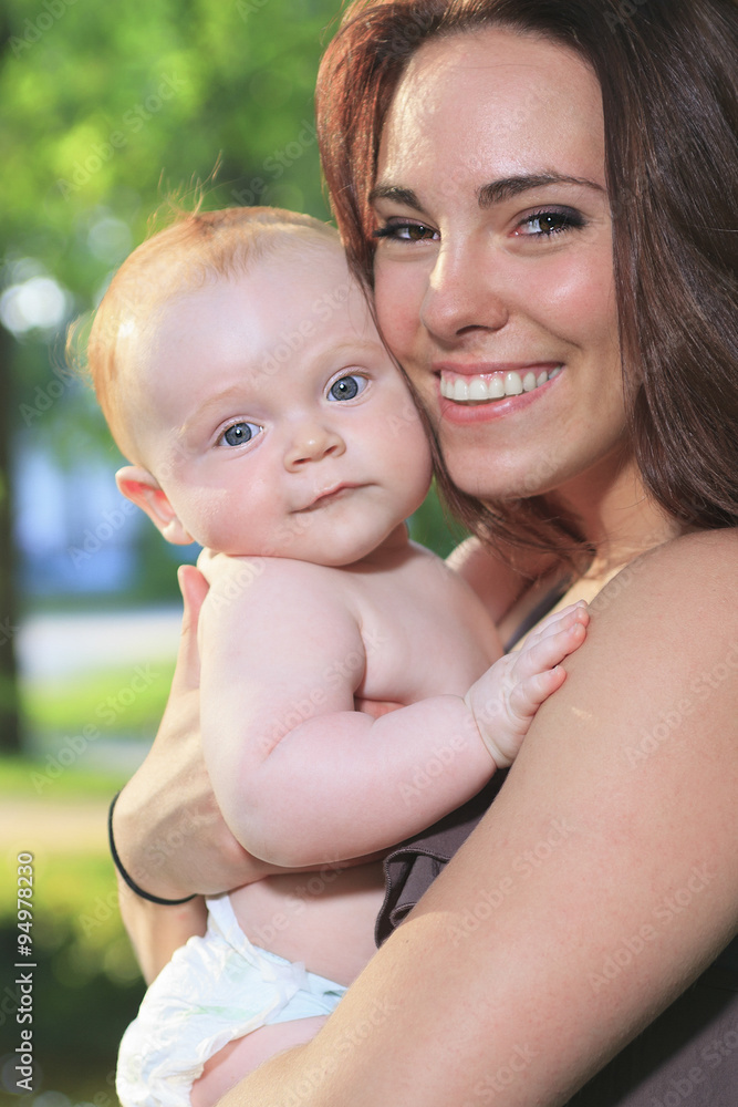 mother with is baby on a beautiful forest mother with is baby on a beautiful forest