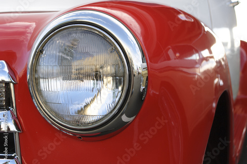 Glass headlight on a vintage car