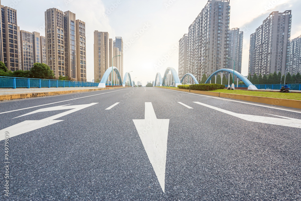 Naklejka premium asphalt road in morden city