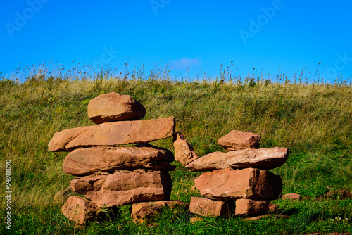 Parent and child inukshuk holding hands