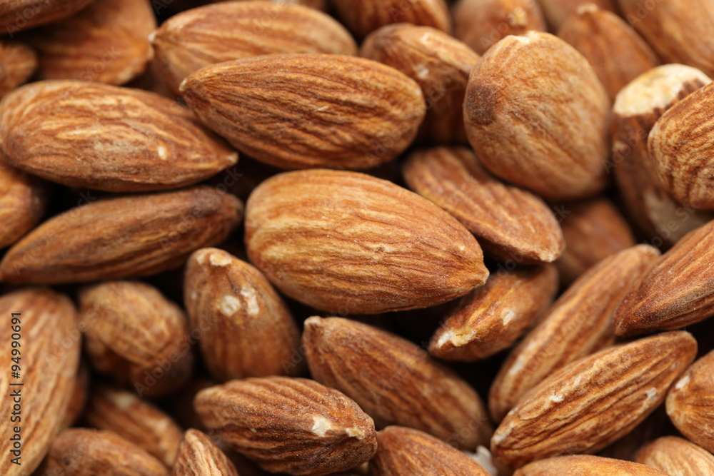 close-up background of peeled almonds close-up background of peeled almonds