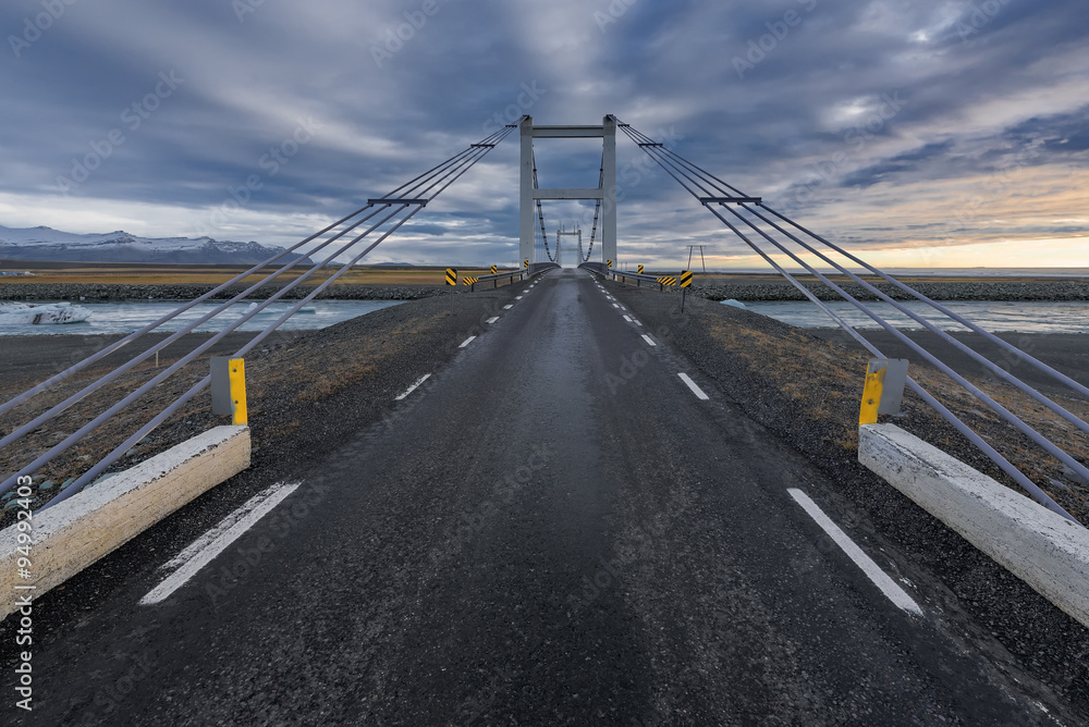 View on road bridge, Iceland,Jokulsarlon is a large glacial lake in southeast Iceland, on the edge of Vatnajokull National Park. View on road bridge, Iceland,Jokulsarlon is a large glacial lake in southeast Iceland, on the edge of Vatnajokull National Park.