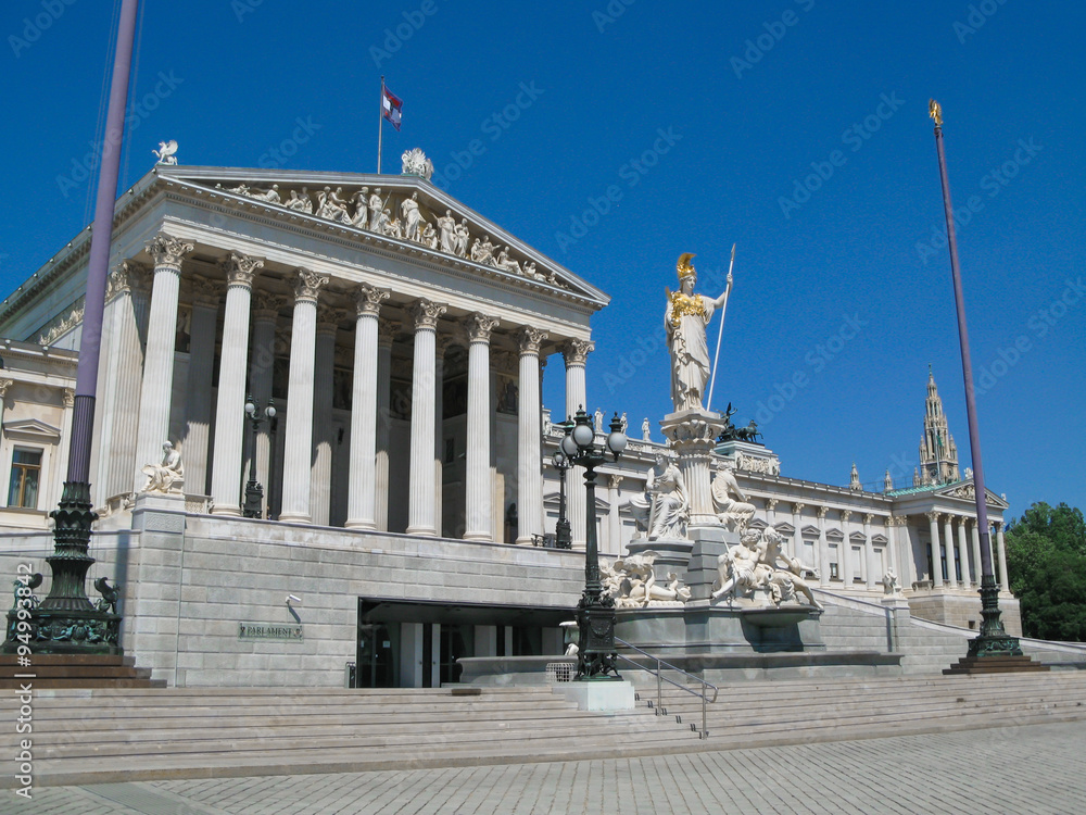 
Austrian Parliament Building in neoclassical style and the famous  Athena Fountain, Vienna, Austria.
