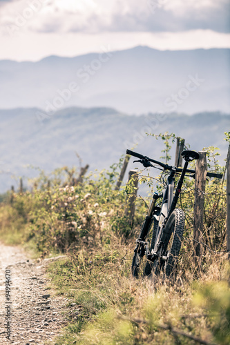 Mountain bike MTB on country road, track trail in inspirational