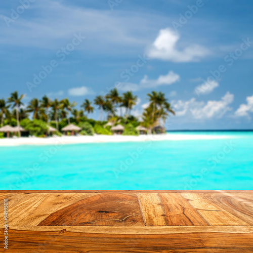 combination of wooden front with blurred tropical island background