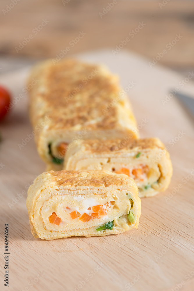 Japanese snack, eggs roll with carrot and onion. Japanese snack, eggs roll with carrot and onion.