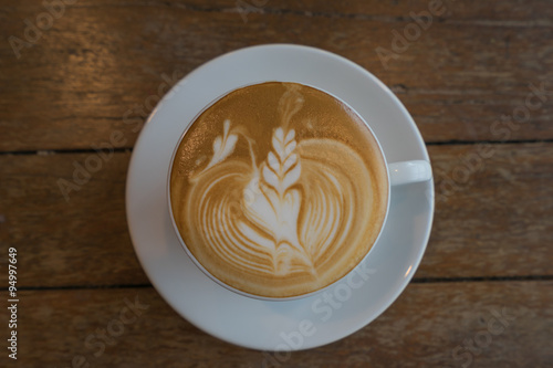 Tail bird heart latte art coffee