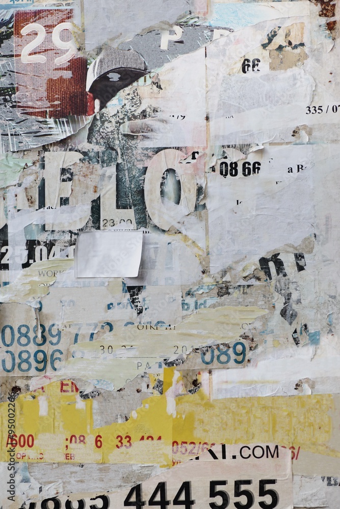 Fototapeta premium Old Billboard With Torn White Paper Posters Texture Or Studio Backdrop Or Vertical Background Isolated