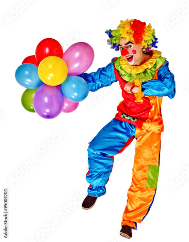 Happy birthday clown holding bunch of balloons. 
