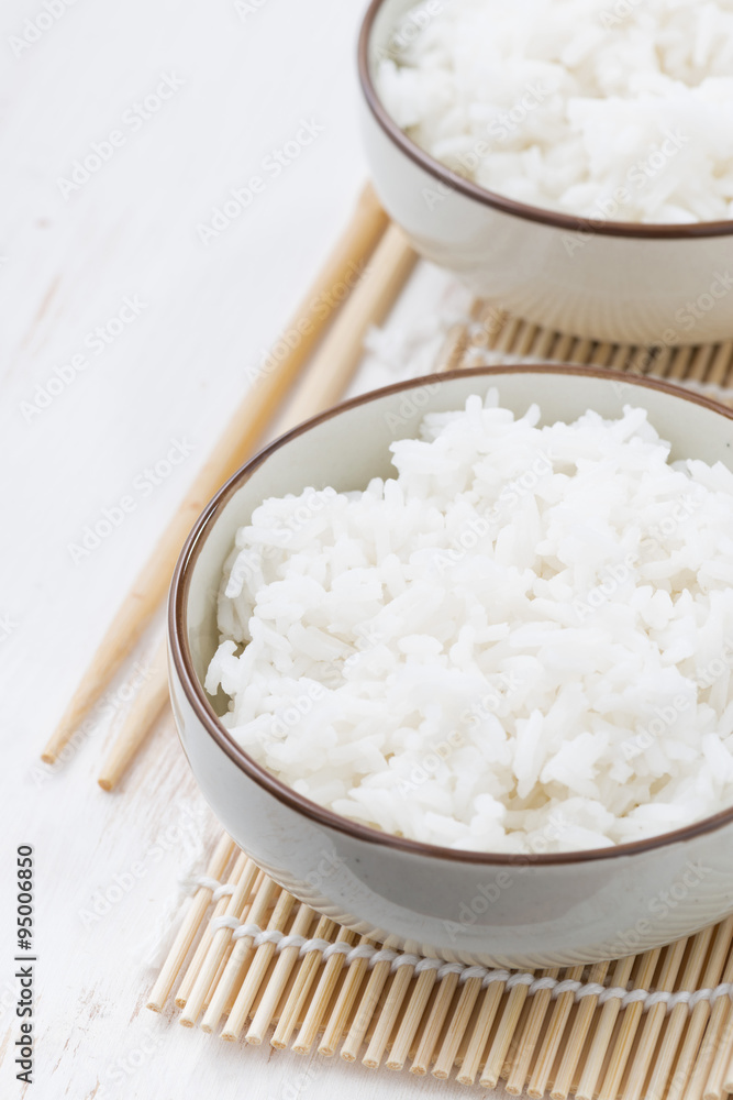 Chinese traditional steam white rice, closeup vertical Chinese traditional steam white rice, closeup vertical