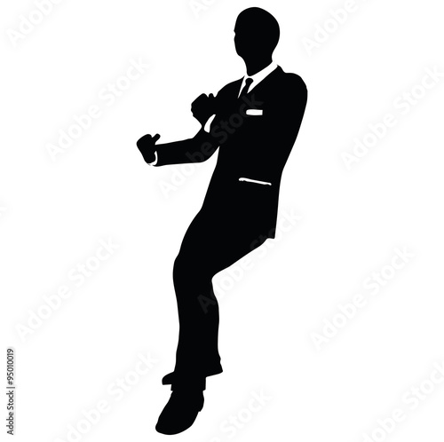 businessman silhouette in gorilla pose photo