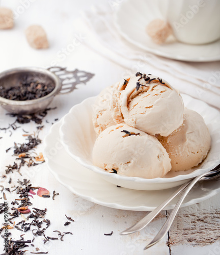 Canvas Print Ice cream with Earl grey tea flavor. White ceramic bowl