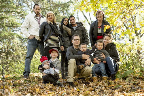 Happy large family with children in autumn park