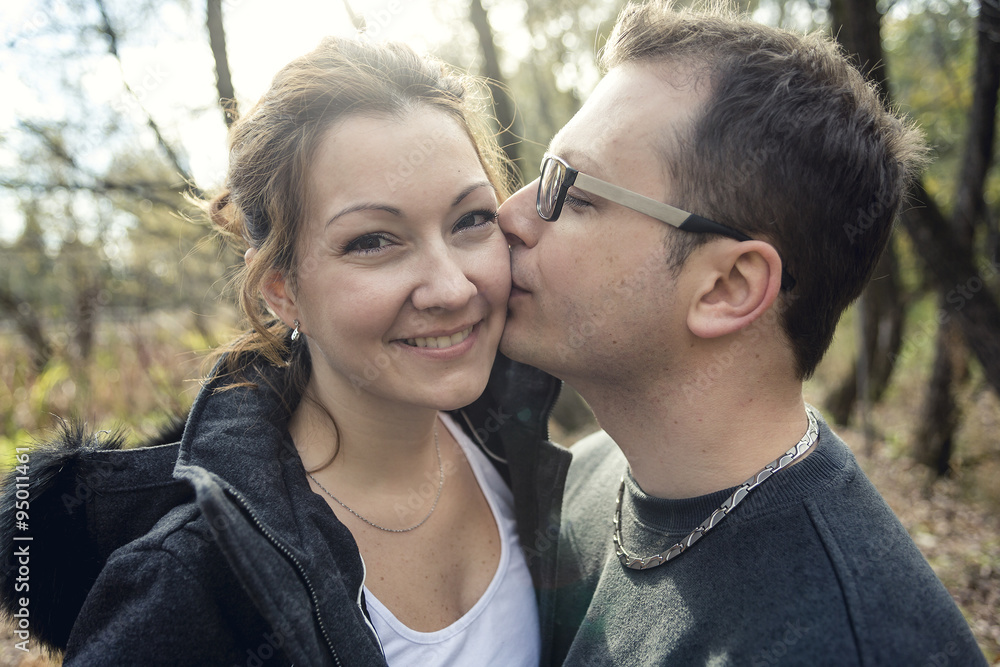 Obraz premium Happy middle aged couple outdoors on beautiful autumn day