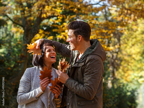 Couple in autumnal surrounding