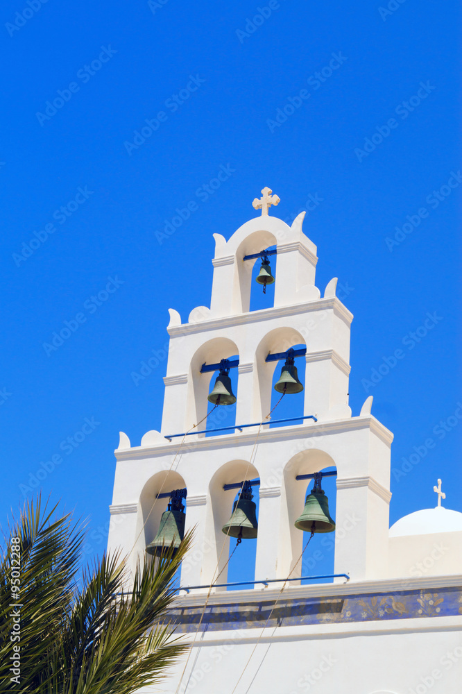 Belfry at blue sky in Oia village, Santorini, Greece Belfry at blue sky in Oia village, Santorini, Greece
