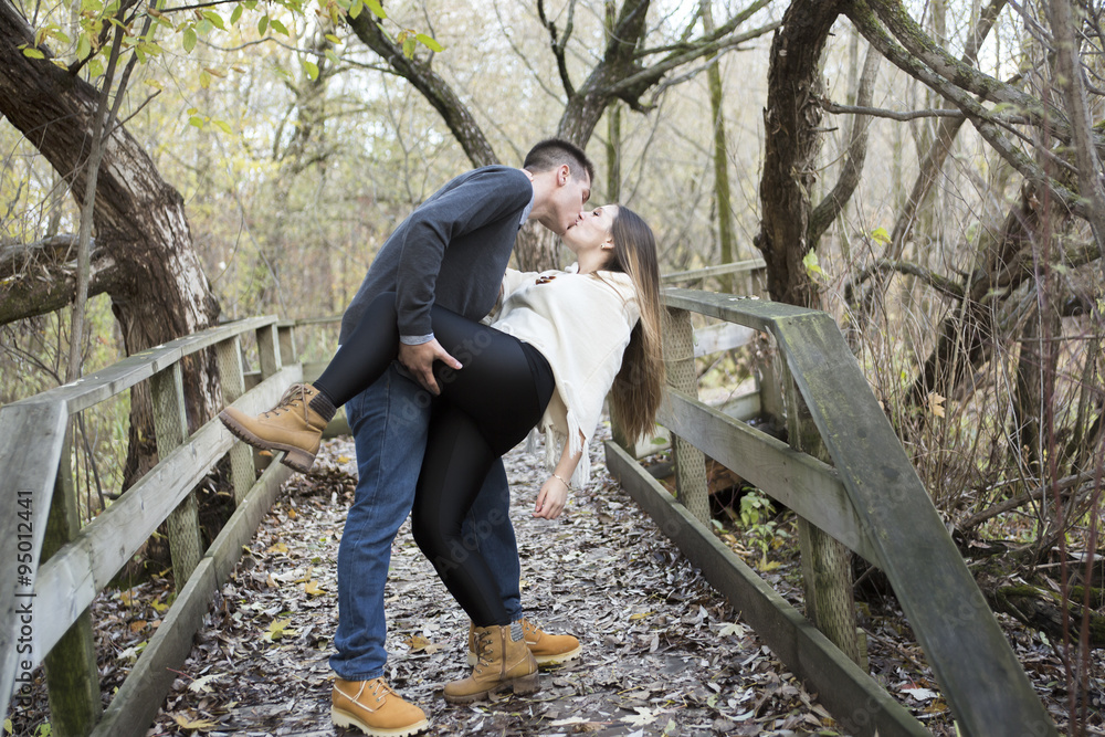 Fototapeta premium Teen couple at autumn park