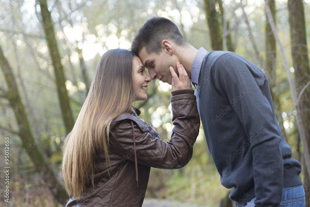 Fototapeta premium Teen couple at autumn park
