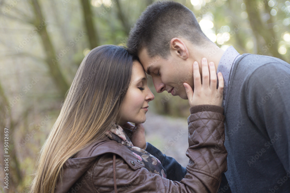 Teen couple at autumn park Teen couple at autumn park