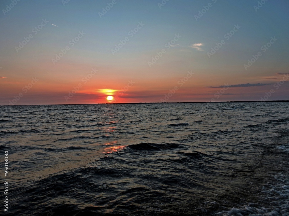 Obraz premium sunset on water