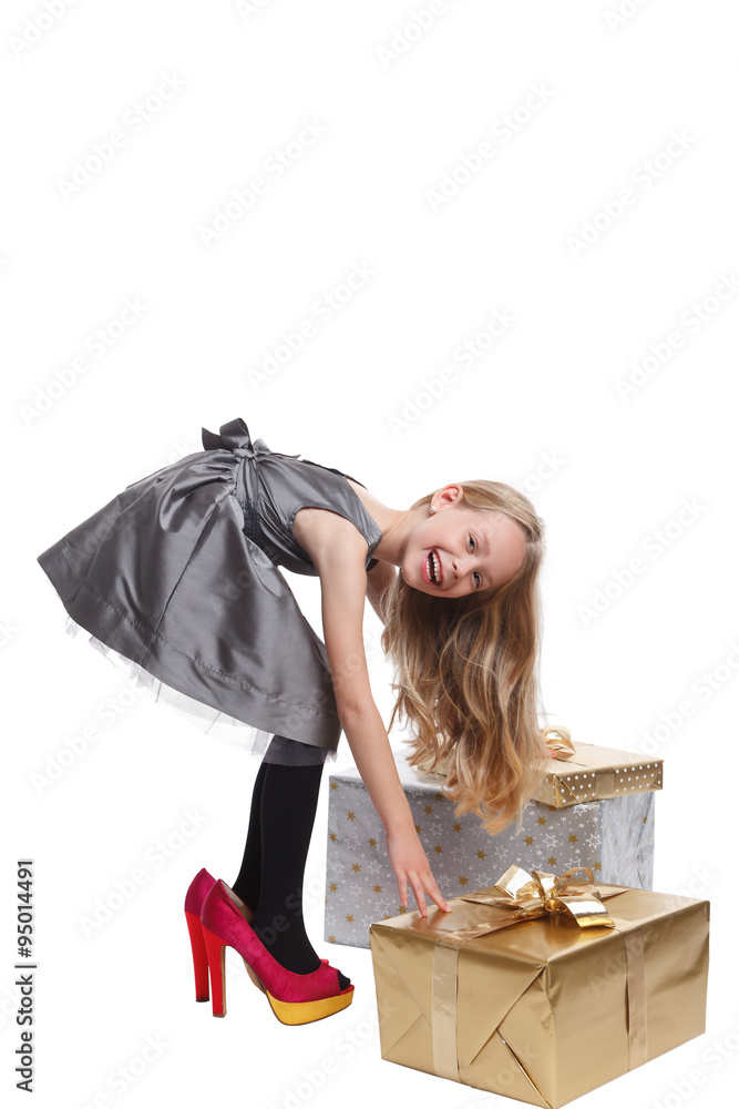 Pretty little girl in high heels foto de Stock Adobe Stock