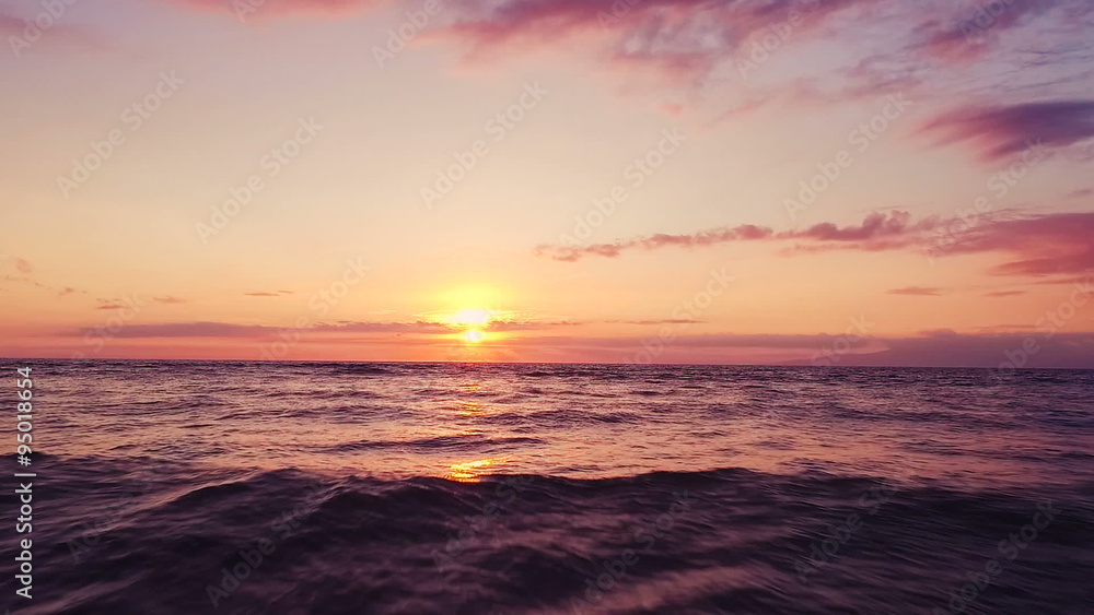 Aerial Flight Over Ocean Waves Into Dramatic and Vibrant Hawaiian Sunset in Slow Motion Aerial Flight Over Ocean Waves Into Dramatic and Vibrant Hawaiian Sunset in Slow Motion