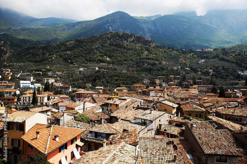 luxurious view of ancient city covered with red tile roofs on th