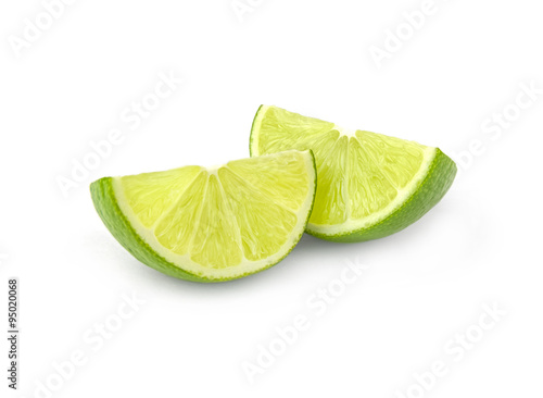Lime wedges on white background
