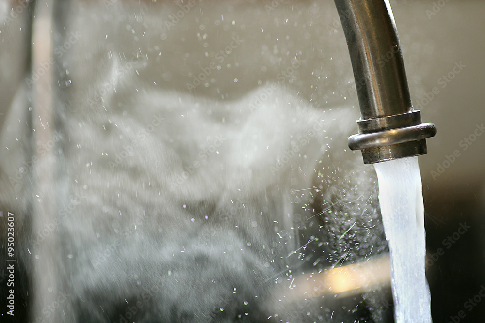 Hot Steaming Water Running from Kitchen Faucet - obrazy, fototapety, plakaty 