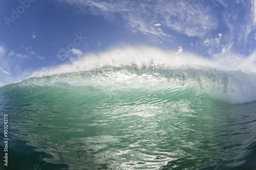 Wave ocean power of crashing water swimming face to face encounter.