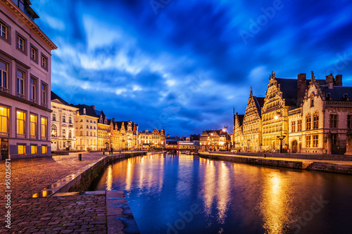 Ghent canal, Graslei and Korenlei streets in the evening. Ghent,