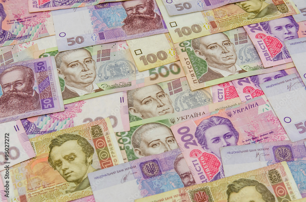 different ukrainian banknotes background close-up different ukrainian banknotes background close-up