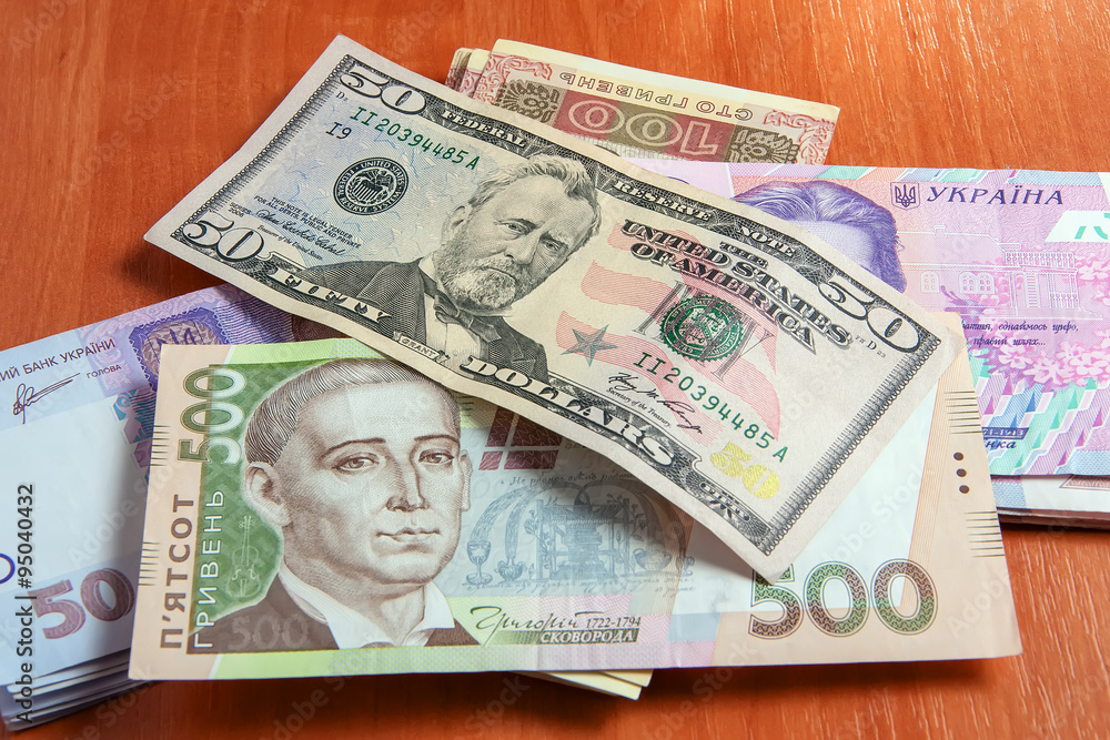Ukrainian and maryanska currency on the table Ukrainian and maryanska currency on the table