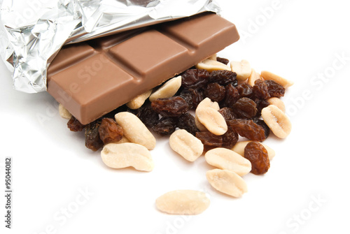 peanuts, chocolate bar and raisins