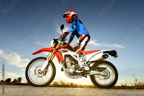 Fototapeta Naklejka Na Ścianę i Meble -  Man With Motocross Byke
