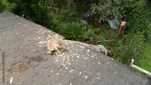 EF0 tornado damage on house roof