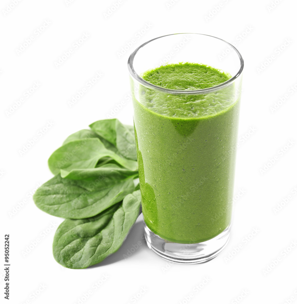 Glass of spinach juice isolated on white Glass of spinach juice isolated on white