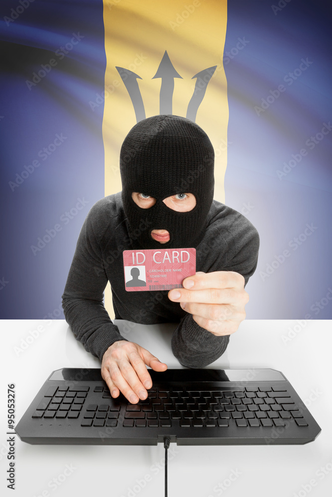 Hacker with flag on background holding ID card in hand - Barbados Hacker with flag on background holding ID card in hand - Barbados