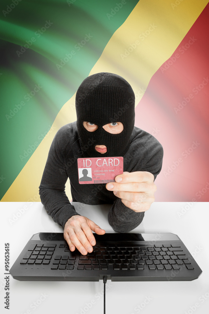 Hacker with flag on background holding ID card in hand - Congo-Brazzaville Hacker with flag on background holding ID card in hand - Congo-Brazzaville