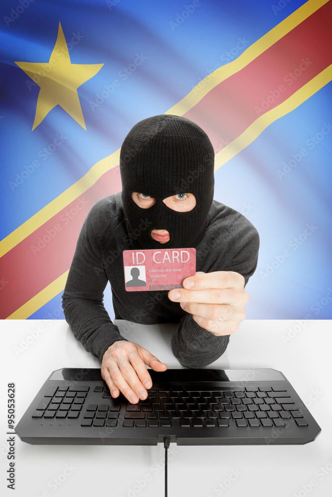 Hacker with flag on background holding ID card in hand - Congo-Kinshasa Hacker with flag on background holding ID card in hand - Congo-Kinshasa