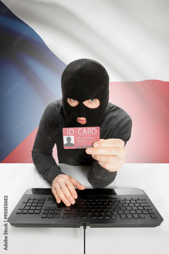 Hacker with flag on background holding ID card in hand - Czech Republic Hacker with flag on background holding ID card in hand - Czech Republic