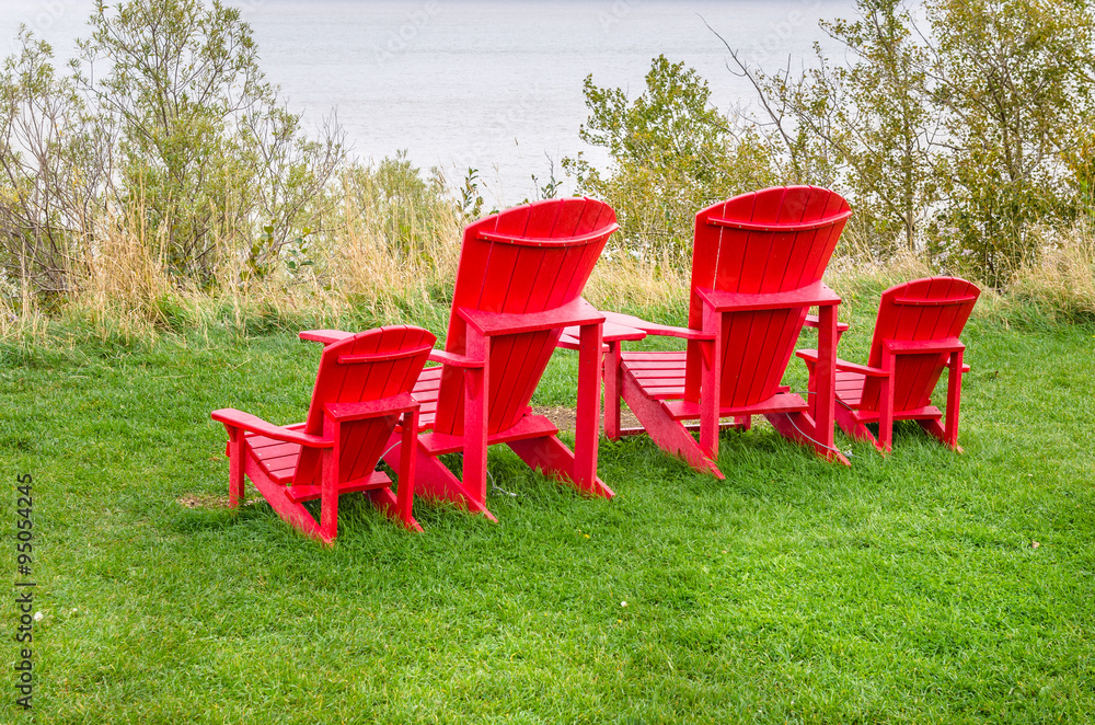Fototapeta premium Adirondack Chairs Facing the Ocean
