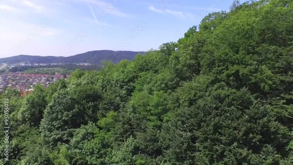 AERIAL: Beautiful suburban town in the middle of nature AERIAL: Beautiful suburban town in the middle of nature