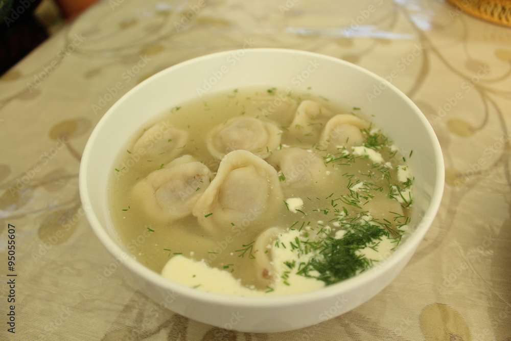 Meat dumplings with crushed herbs on top. Meat dumplings with crushed herbs on top.