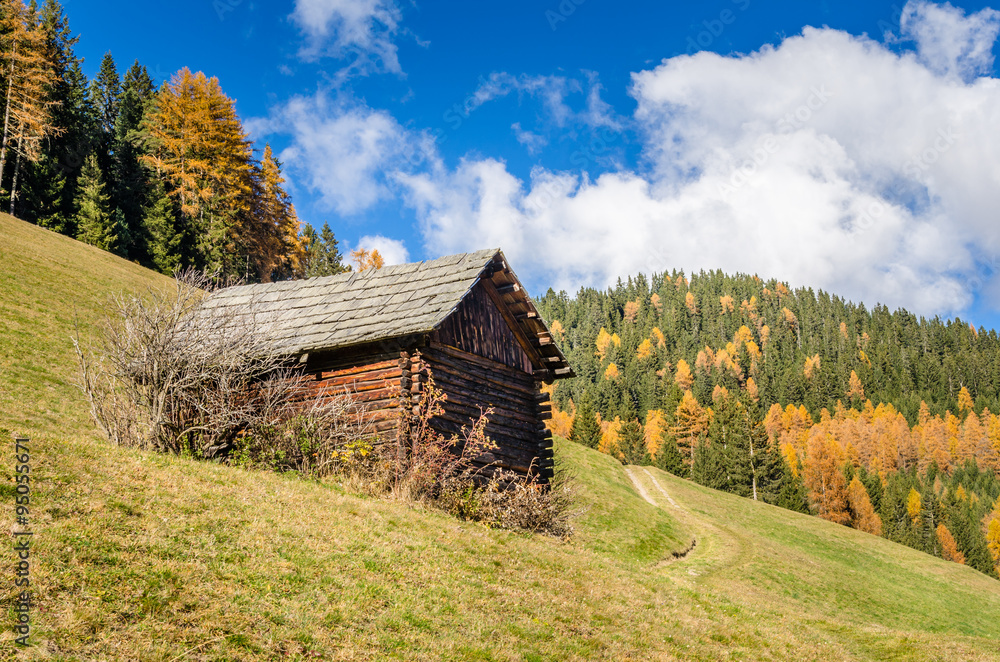 Wooden Hut in the Alps on a Clear Autumn Day Wooden Hut in the Alps on a Clear Autumn Day