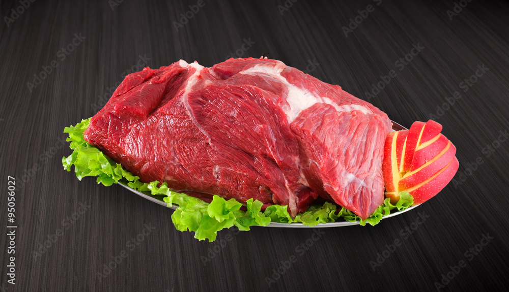 Decorated fresh raw meat - ham with vegetables with clipping pat Decorated fresh raw meat - ham with vegetables with clipping pat