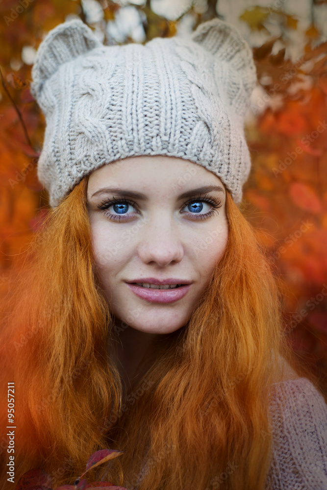 Autumn portrait of the woman in knitted hat Autumn portrait of the woman in knitted hat