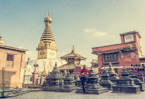 Woman looking at temple.