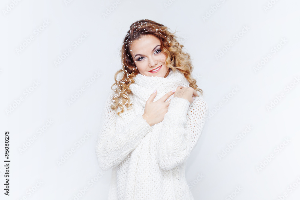 Woman in warm knitted scarf and gloves, portrait on white background, place for your text Woman in warm knitted scarf and gloves, portrait on white background, place for your text